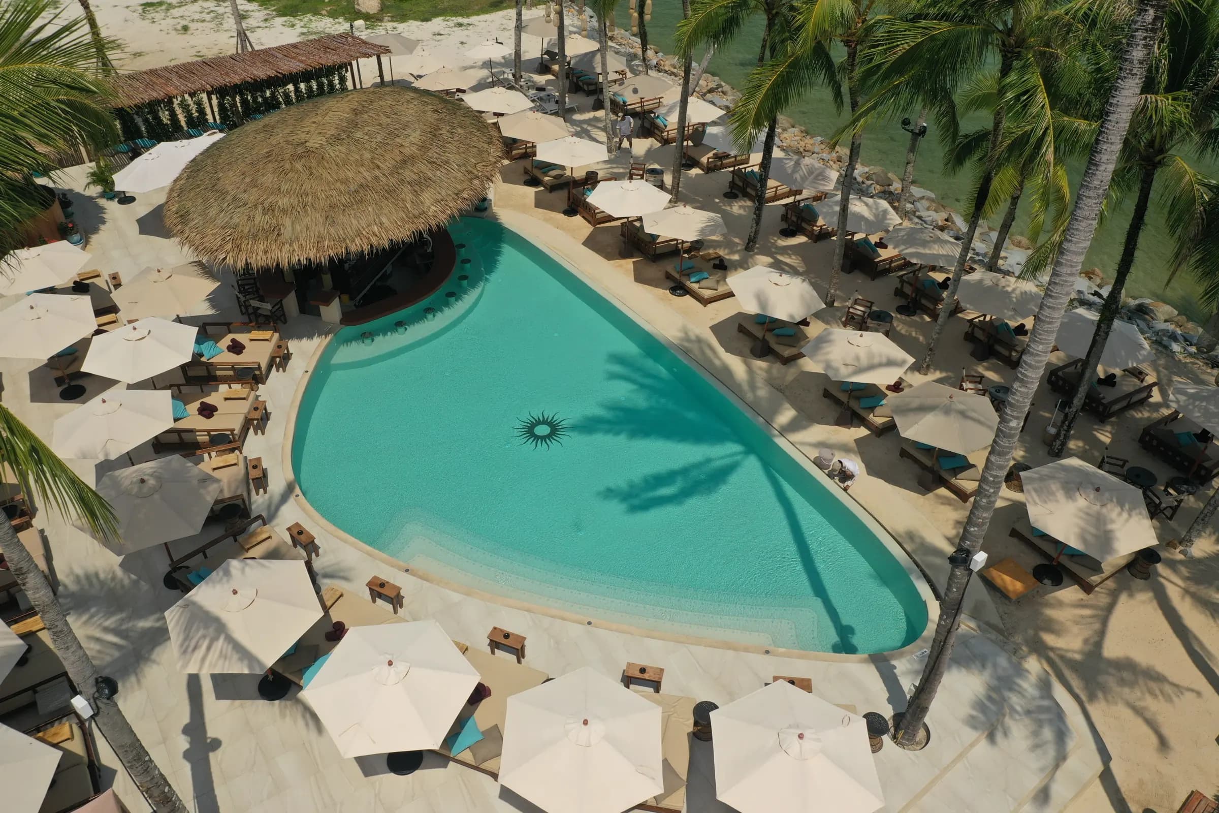 Carpe Diem beach club pool in Phuket from the air