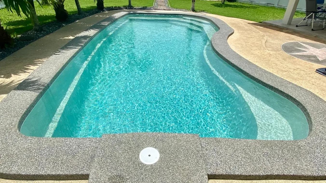 Freeform garden pool after renovation