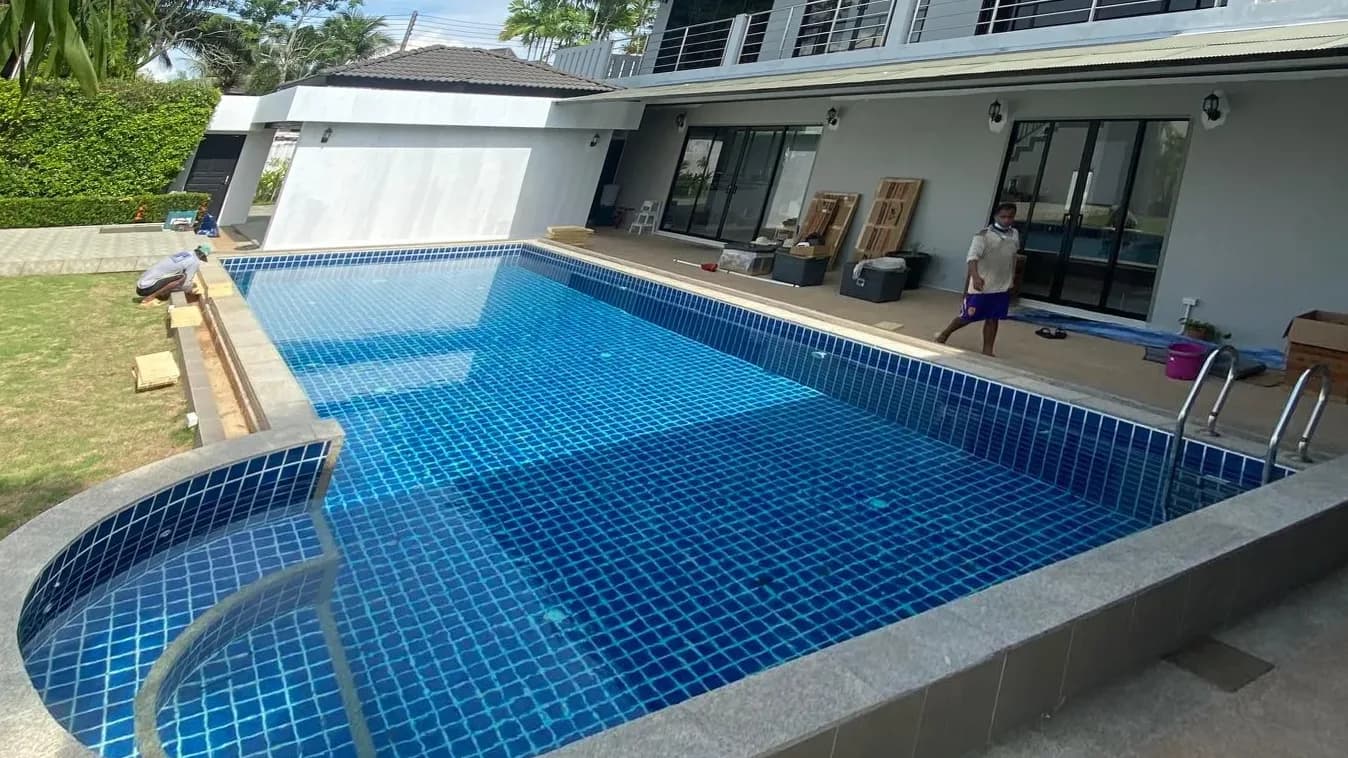 Pool lit for the evening before renovation