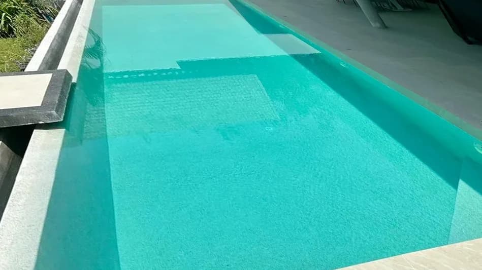 Lap pool with lane lines after renovation