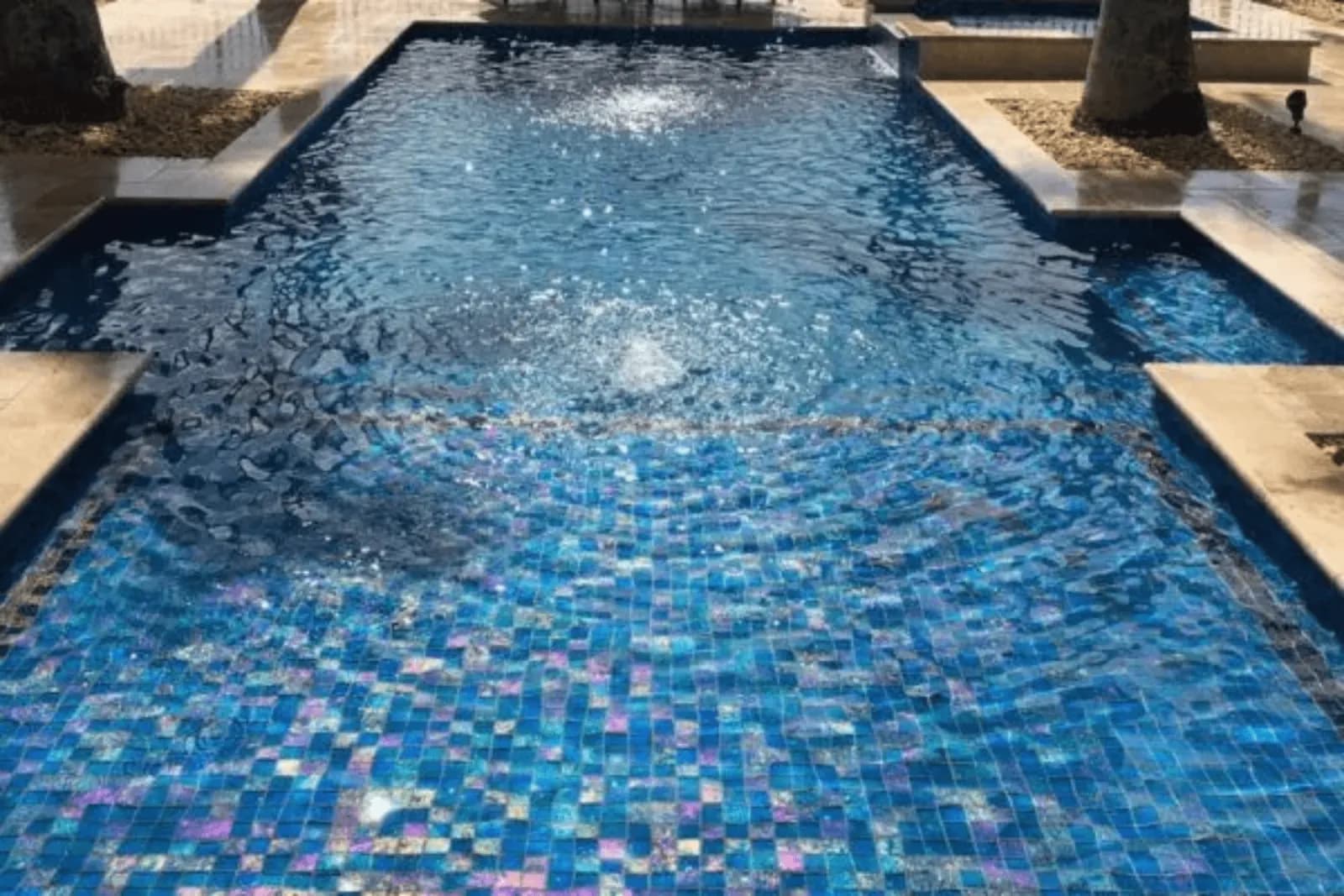 Why PebbleTec Is Better Than Traditional Pool Tiles