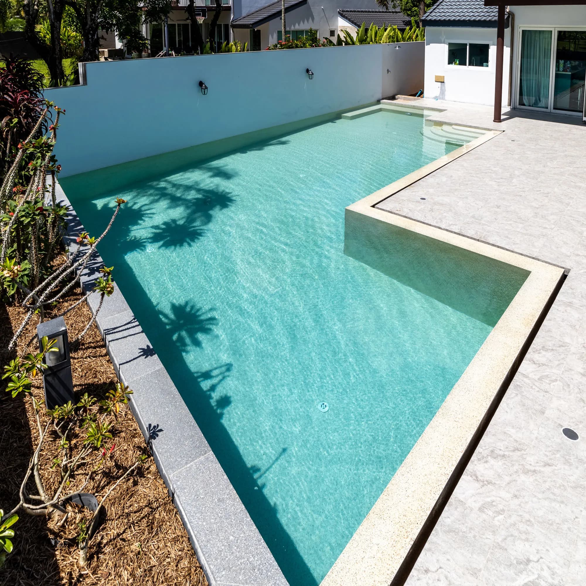 L-shaped villa pool